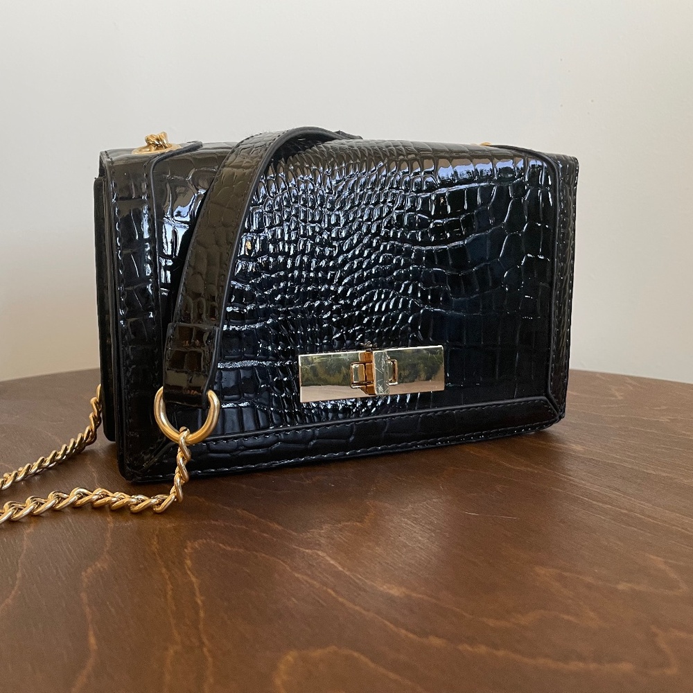 Stradivarius black patent clutch